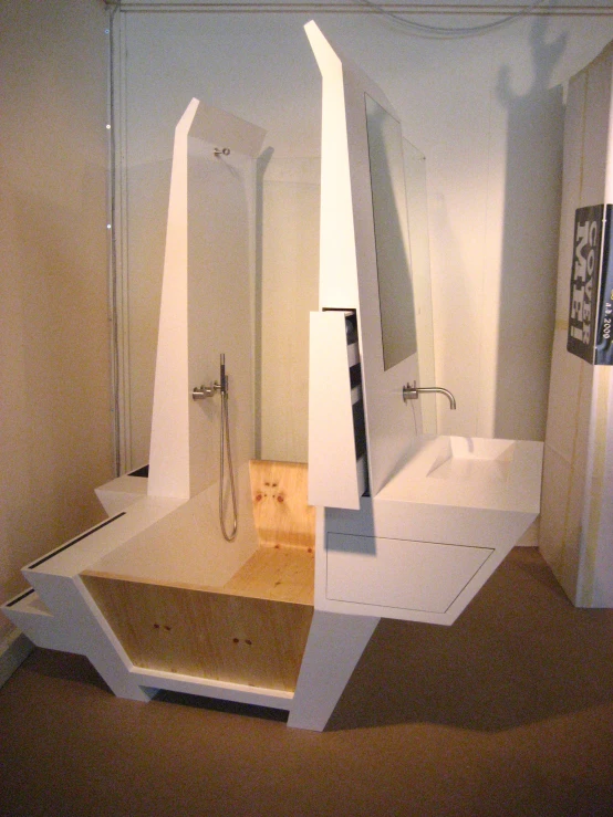 an unusual bathroom features an unusual white sink