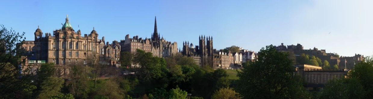 a very big castle with many spires and trees