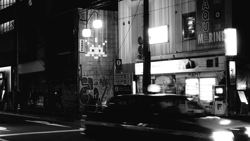 an image of city buildings at night time