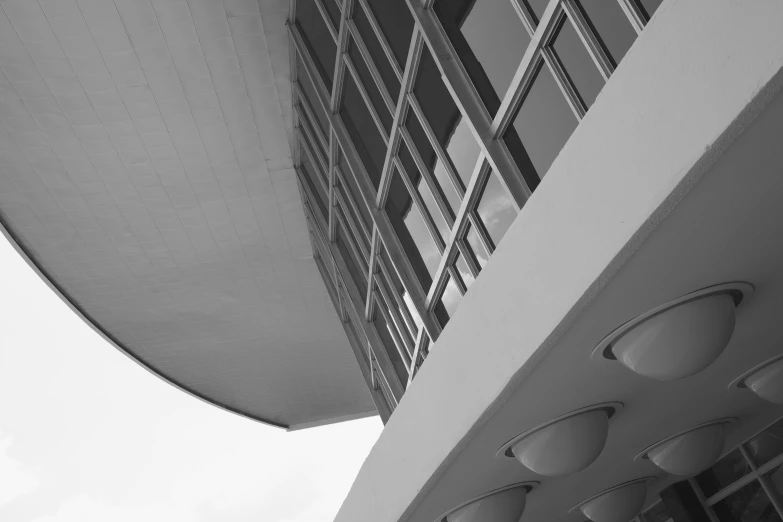 the view of a building from below, looking up