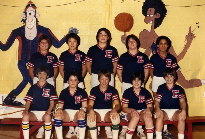 several young people are posing in uniforms