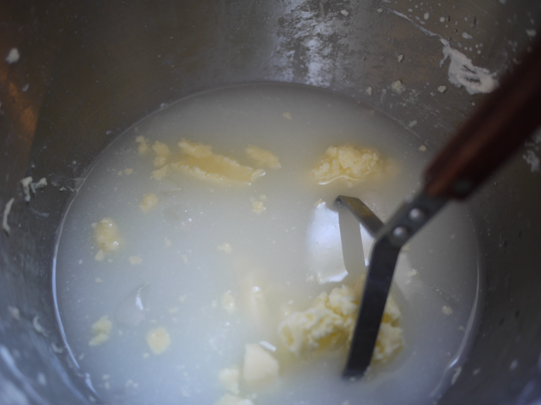 an empty bowl with soing in it, that looks very dirty