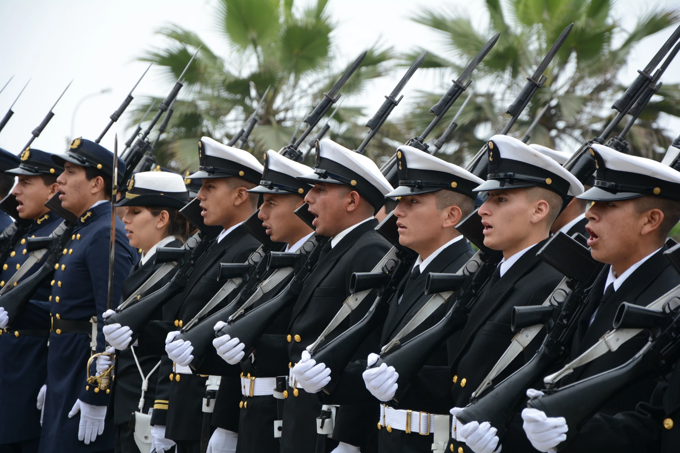 uniformed men in uniform standing in a row