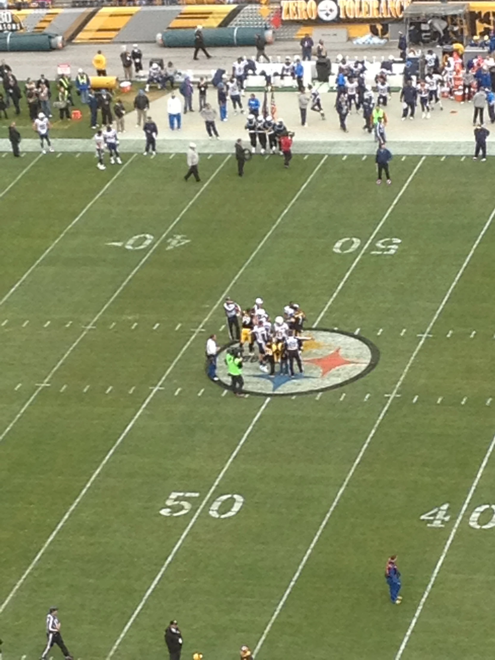 a football team is on the field at a game