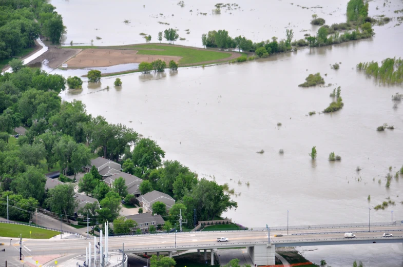 flooding has left homes flooded off and the roadway