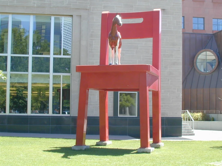 the giant chair has a horse on it