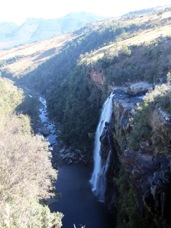 a big waterfall that is being viewed from the air