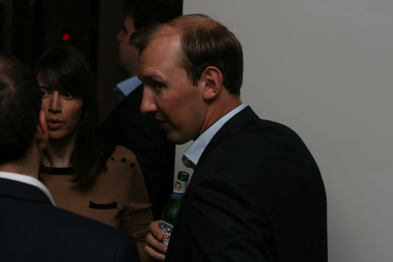 a man and woman standing next to each other