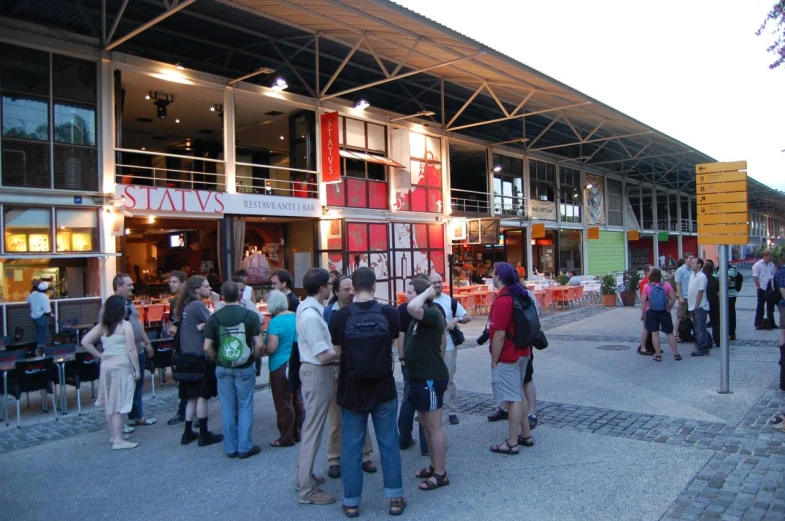 a group of people in front of a store