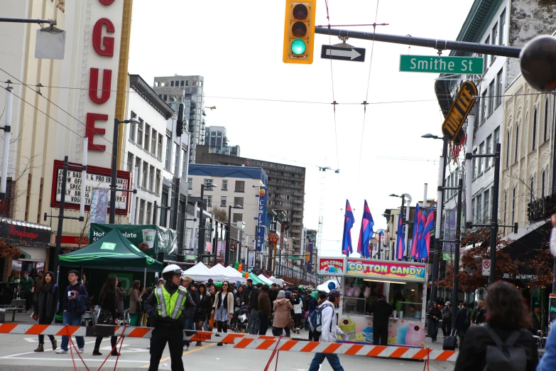 there are people walking on the street together