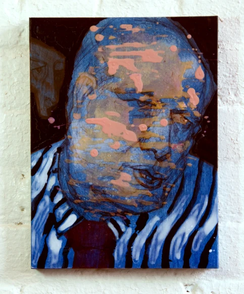 a large portrait of a man that has multiple colors on it