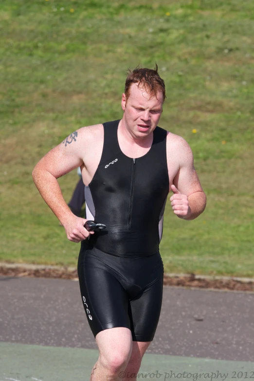 a male athlete in his swim suit