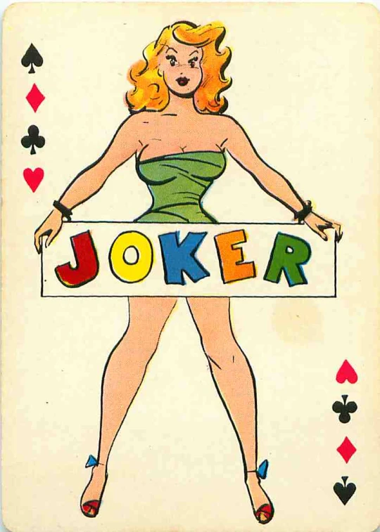 the woman holds the sign for the joker