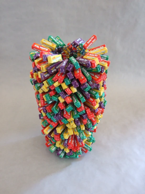 a toy has many pieces of candy stacked in it