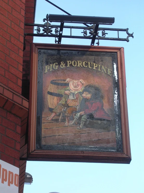 a restaurant sign with the words pig & porcupine on it