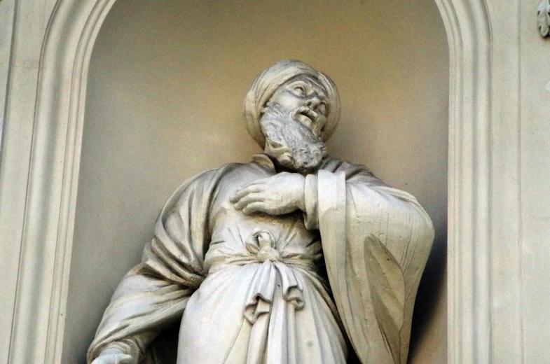 statue of a person with a white robe
