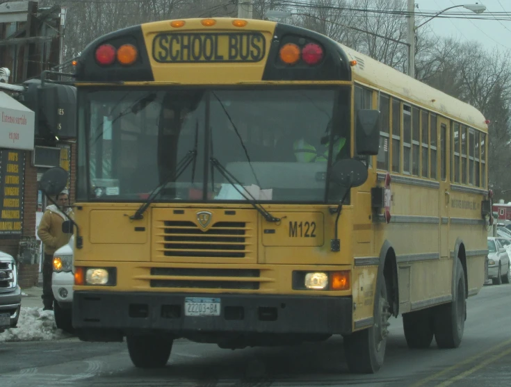 a school bus is going down the road