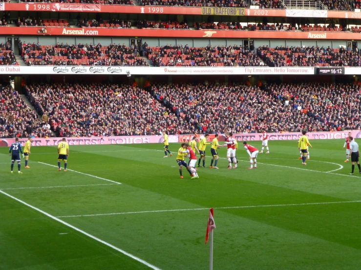 a soccer game going on in the stadium