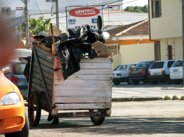 an old garbage truck is filled with things