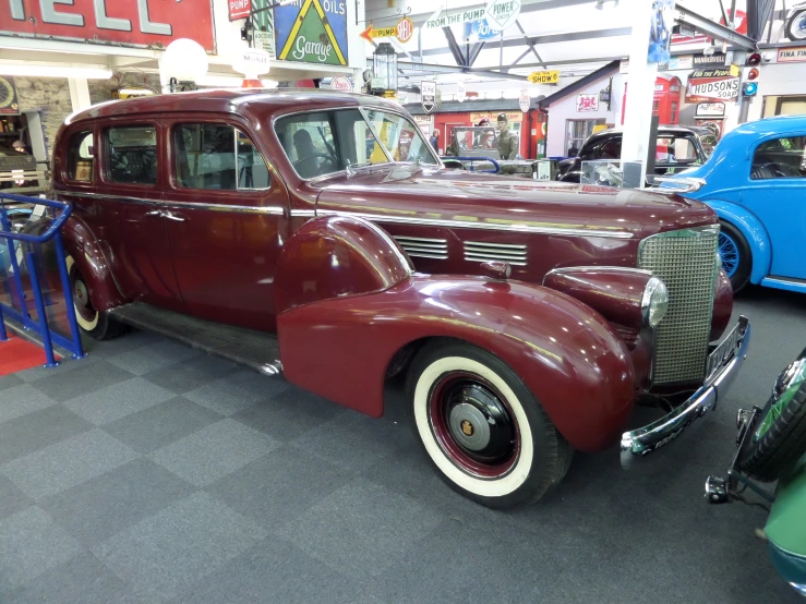 an antique car on display at a show