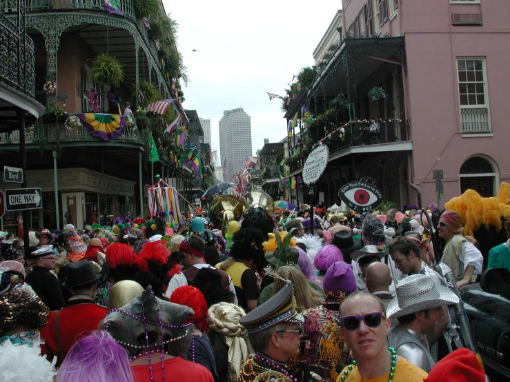 some people dressed in fancy clothing and hats