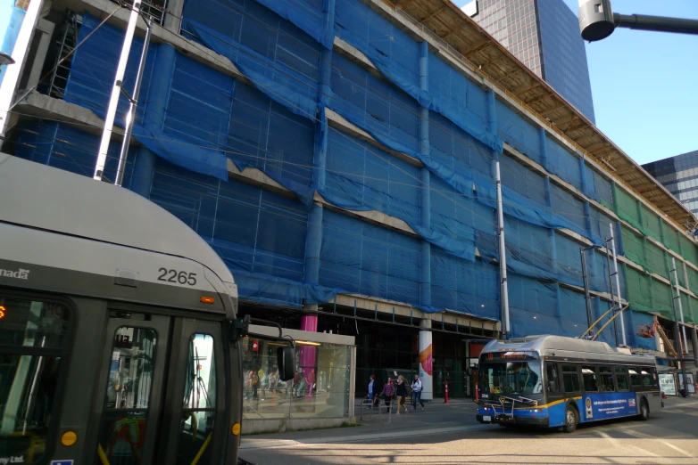 the blue building is being built and its surrounding is under construction