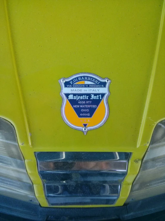 a green truck with some badges on it