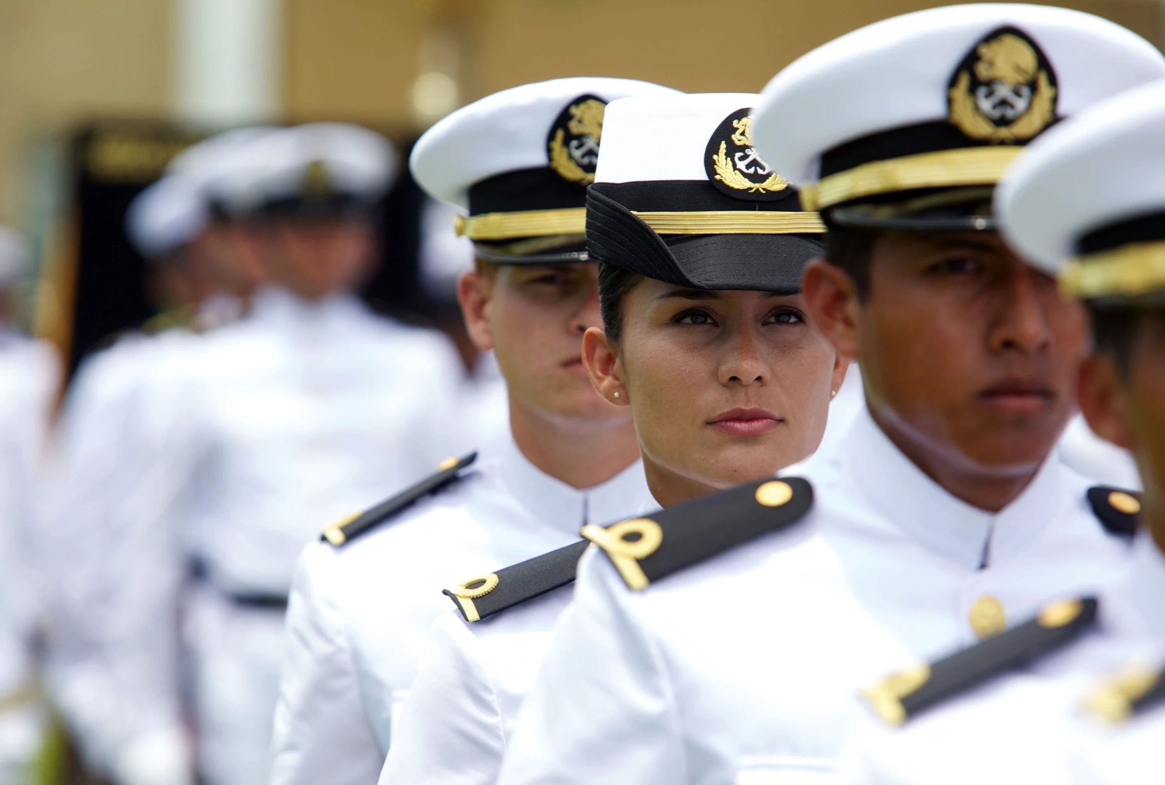 group of sailors standing together at the military parade