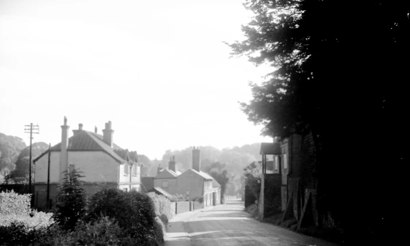 a small alley way with buildings in the background