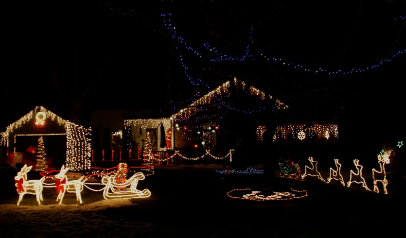 the christmas lights on the houses in the neighborhood