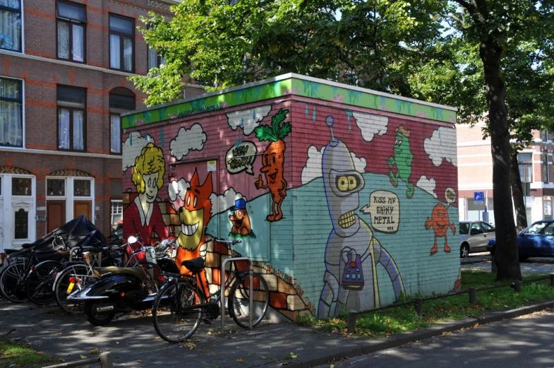 two colorful boxes painted on the side of a building