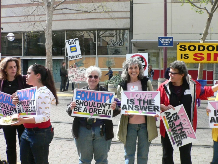 there are many women protesting outside on this street