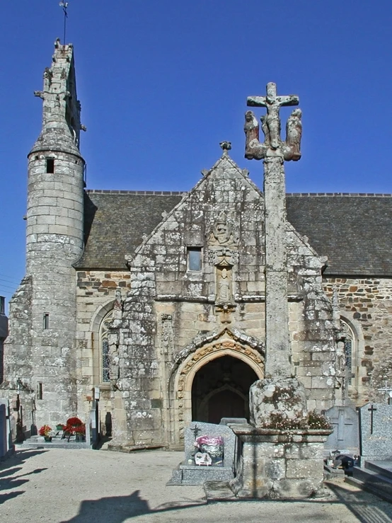 a large stone building with a tower