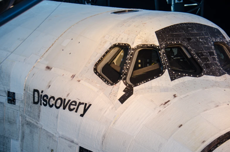 the nose window of a space shuttle in very close proximity