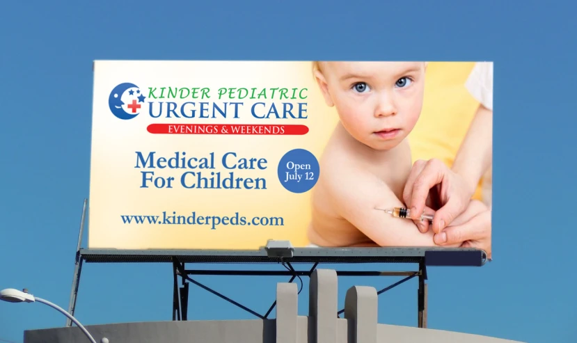 an advertising sign featuring a baby on a billboard