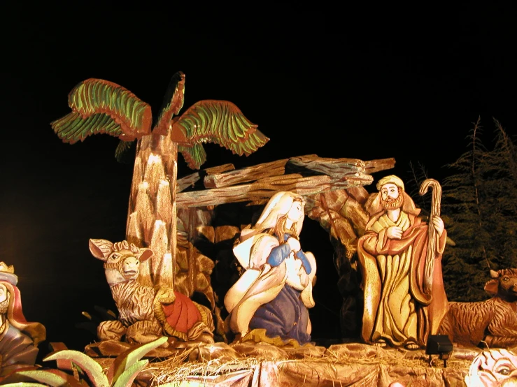 a nativity scene featuring mary, joseph and two wise men