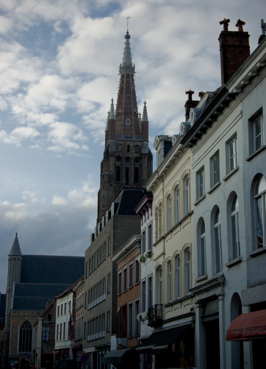 an old looking church on the top of a hill