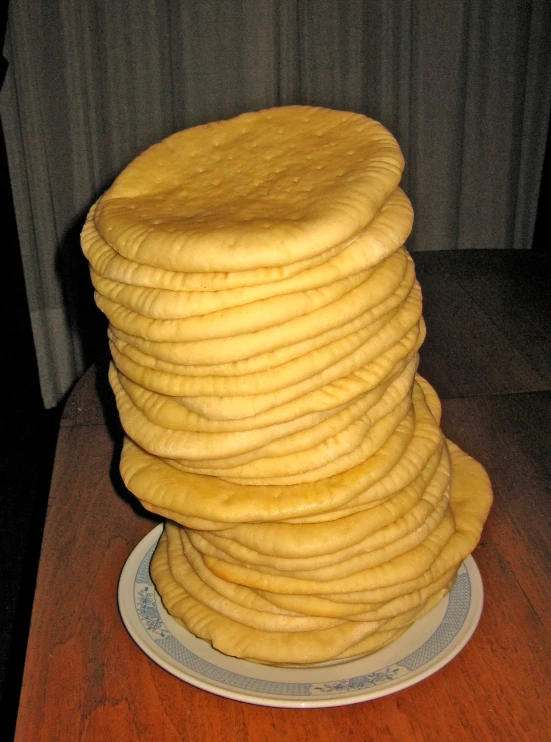 a cake made to look like the stack of pancakes is on top of the table