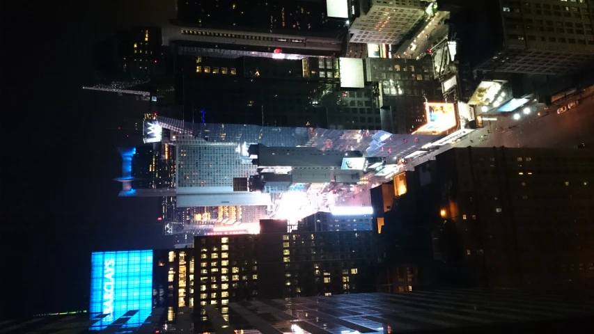 the view from top of a tall building at night