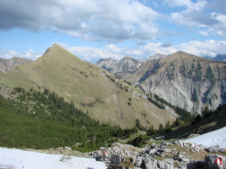 two mountain ranges are shown from high up in the snow