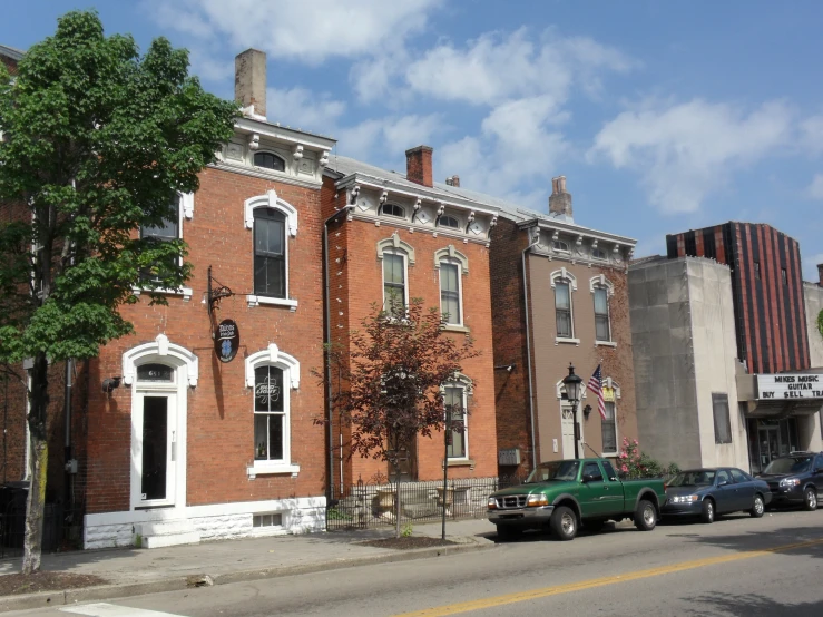 the brick building with arched windows has many windows