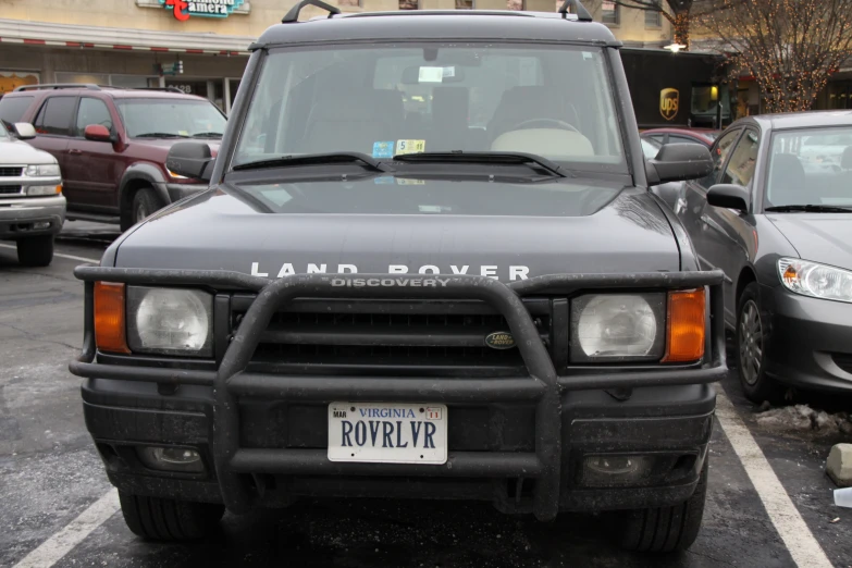 an suv is parked in a parking lot