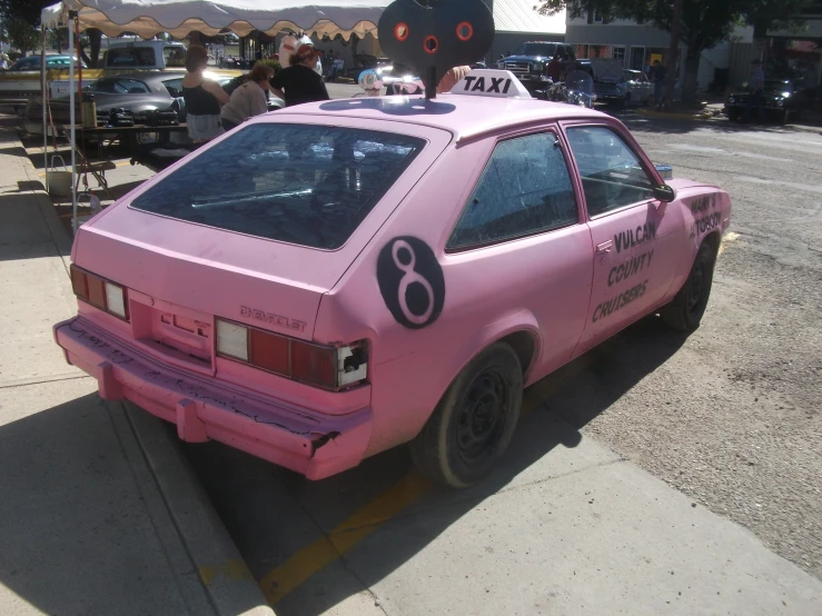 a car parked in the parking lot of a public place