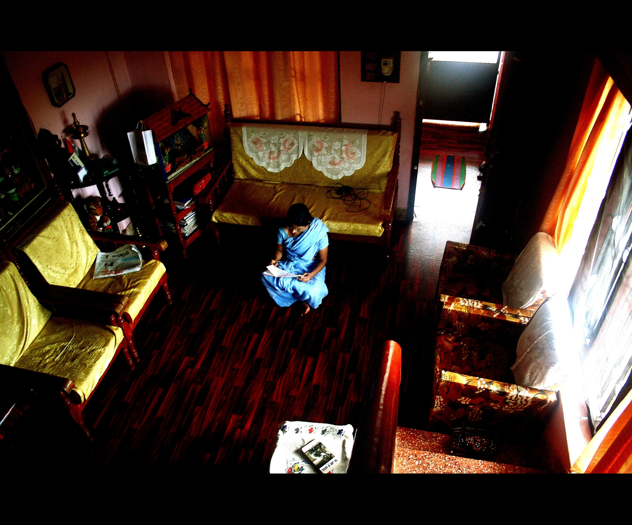 a man sitting in his chair in the living room