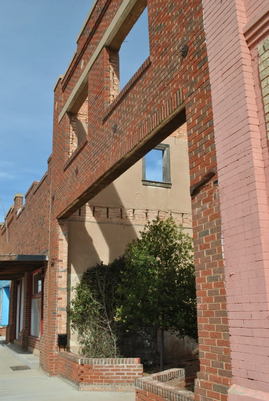 a stop sign is shown in front of a building