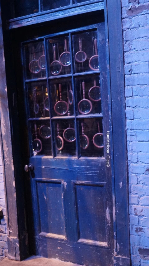 the front door of an old brick building has a decorative window