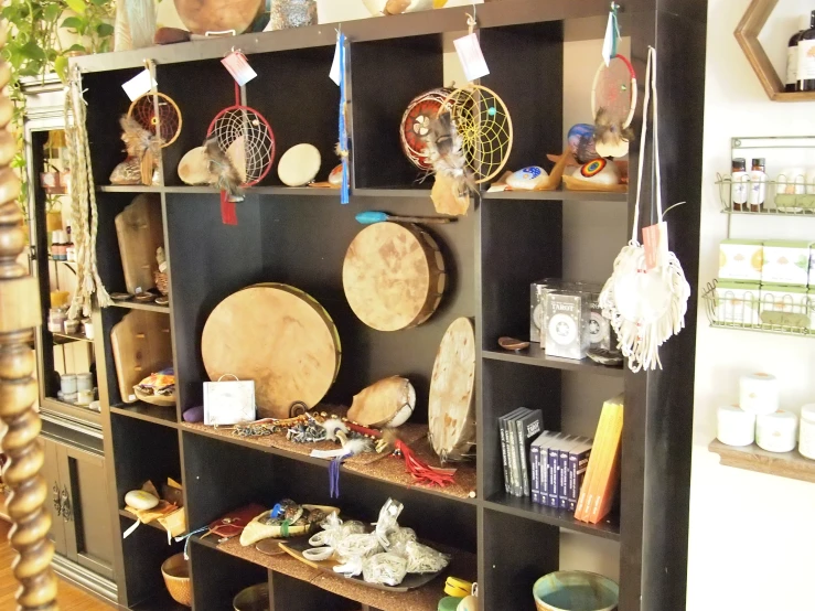 a room with lots of shelves filled with various objects