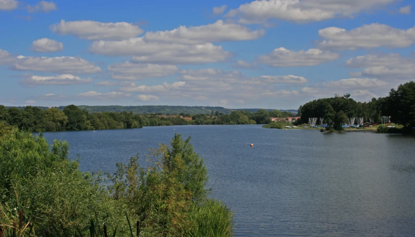 an image of a beautiful lake with water surrounding it