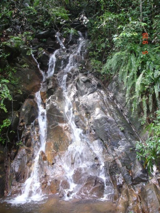 there is a waterfall that goes down a hill