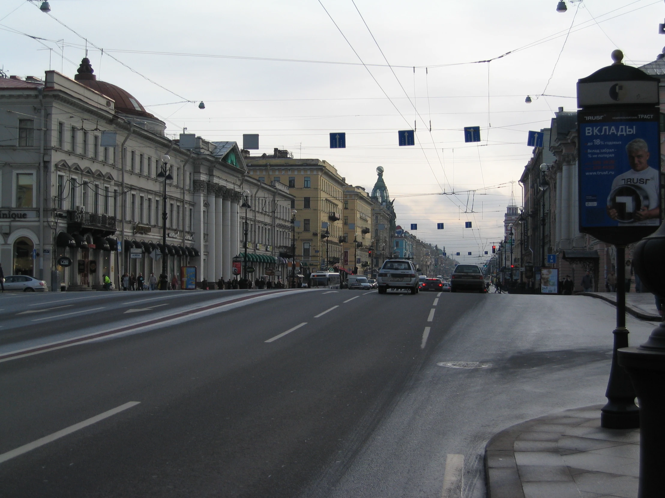 street scene with cars and buildings on an overcast day